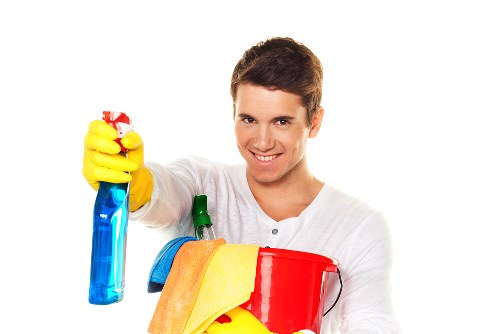 Cleaning a bathroom in a Wandsworth flat before new occupants move in